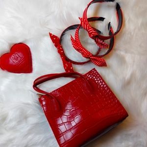 Red childrens handbag and 3 red headbands